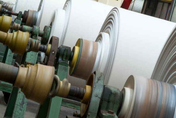 istock Row of fabric rolls in textile industry 1478017101