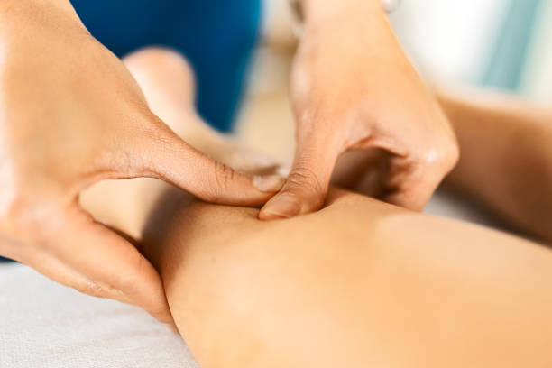 istock Close up of therapist hands massaging 1478018430