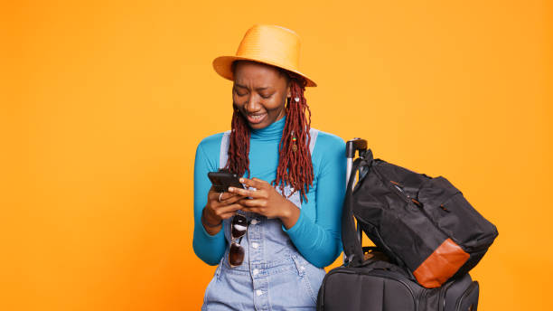 istock Female tourist checking mobile phone 1478023133
