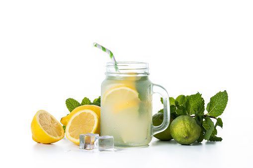 Lemonade drink in a jar glass isolated on white background