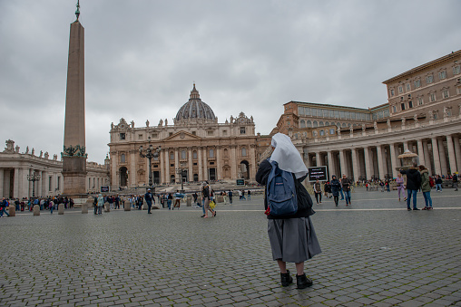 Rome Italy 14 March 2020:Piazza san Pietro People in queue waiting to enter St. Peter's Basilica