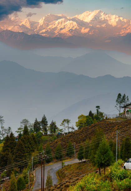 Majestic Kanchenjunga. Landscape View of Kangchenjunga, also spelled Kanchenjunga, the third-highest mountain in the world with Cityscape. kangchenjunga stock pictures, royalty-free photos & images