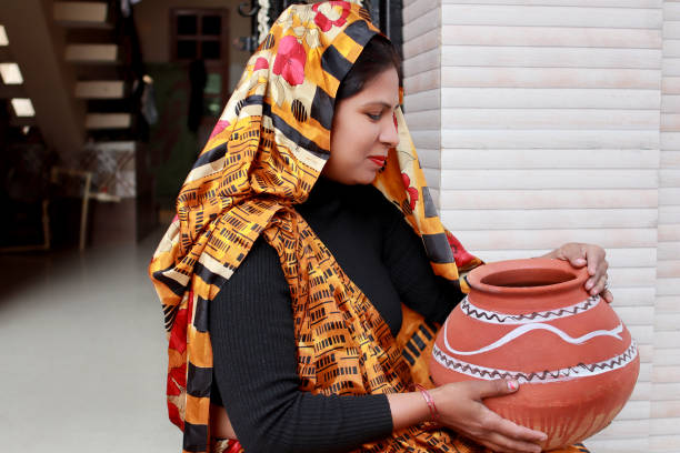 istock Rural woman with water pot 1478038311