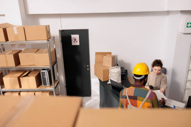 istock Diverse coworkers discussing merchandise packaging details 1478038419