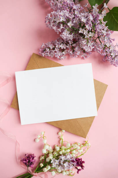 istock greeting card layout. lilac bouquet and white blank for text 1478039511