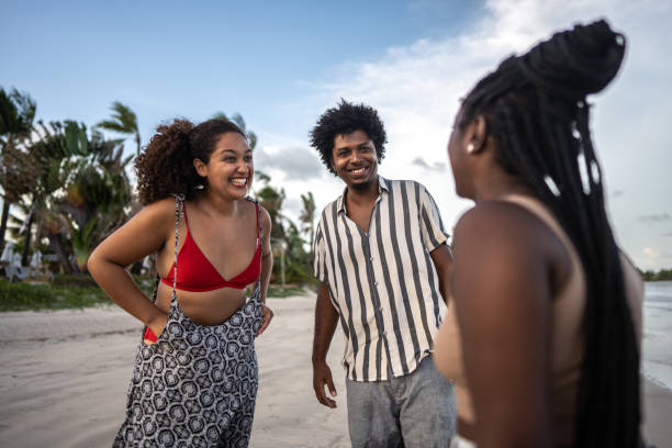 Friends talking at the beach