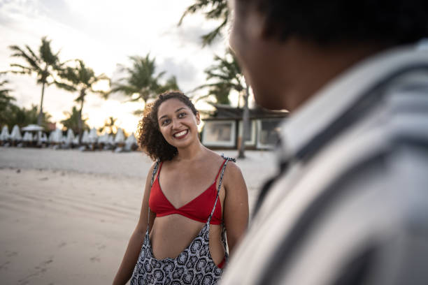 istock Friends talking at the beach 1478045609
