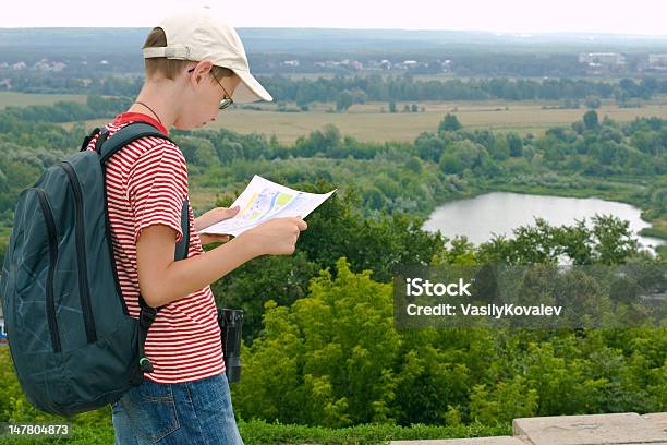Boy With Binoculars Backpack And Map Stock Photo - Download Image Now - Map, Reading, Child