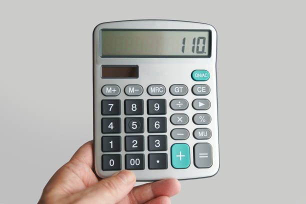 istock Male hand holding a calculator 1478050876