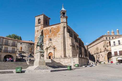 Trujillo main square. Church of San Martin Tours and statue of Francisco Pisarro (Trujillo, Caceres, Spain).