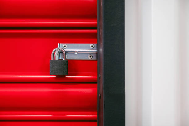 Padlock of self storage door with red door