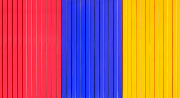 Ribbed cardboard with the colors red, yellow and dark blue.  Meant as background