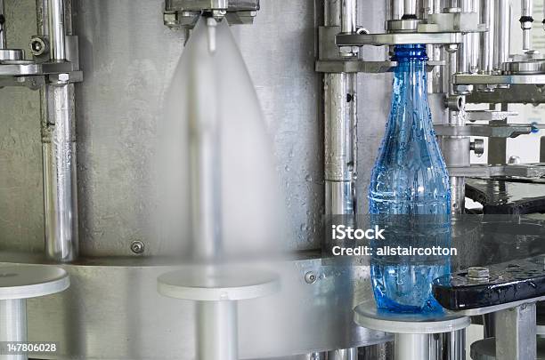 Water Bottle Production Machine Stock Photo - Download Image Now - Automated, Blue, Bottle
