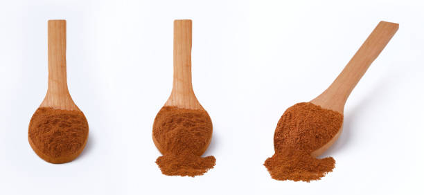 istock Ground clove on wooden spoon, isolated on white background 1478062397