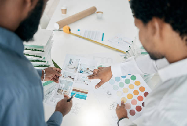 istock Architecture, interior design and planning with architect and men work together, collaboration and construction, renovation and color choice. Design, plan and creative with team discussion top view. 1478065323