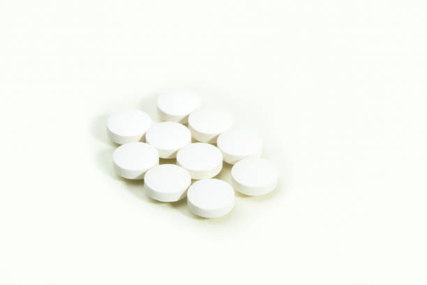 Medicine tablets on white background stock photo
