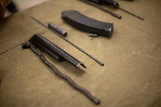 istock Disassembled machine. Military training. Weapon parts. Firearm. 1478074881