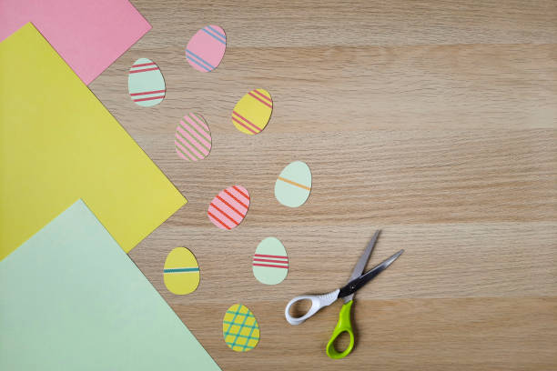 istock Children's creativity - cutting out Easter decor from paper. Flat lay. 1478075063