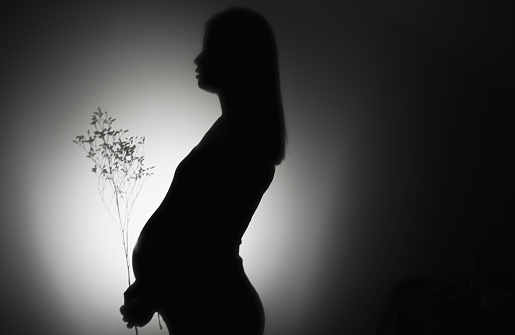 Pregnant woman standing