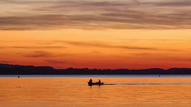 istock fishing boat lake Chiemsee 1478079621