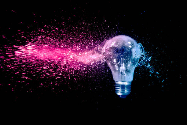 istock blue and red electric bulb shattering 1478084517