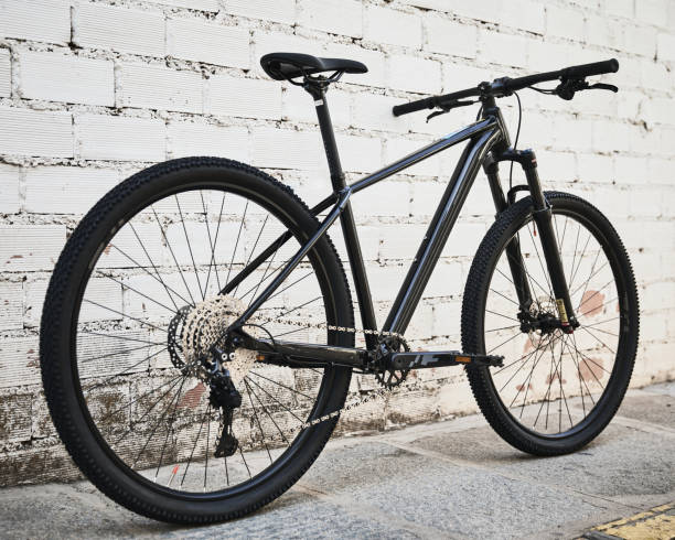 istock mountain bike leaning against a white wall 1478086409