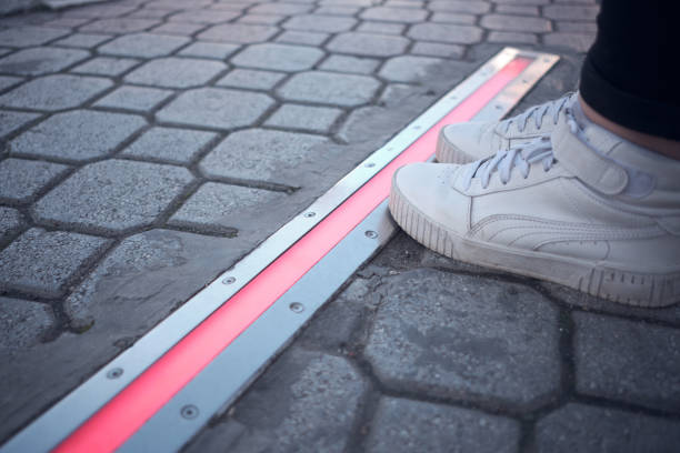 istock Integrated crosswalk stoplight for pedestrians in asphalt. 1478087944