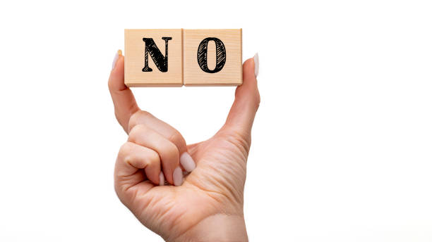 istock Wooden cubes with text no on a red background. Negative answer concept. No risk, no violence or no discrimination concept. 1478092400