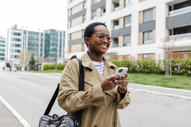 istock Well dressed woman walking with a smile 1478093555