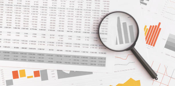 istock Business graphs, charts, magnifying glass and calculator on table. Financial development, Banking Account, Statistics 1478094772