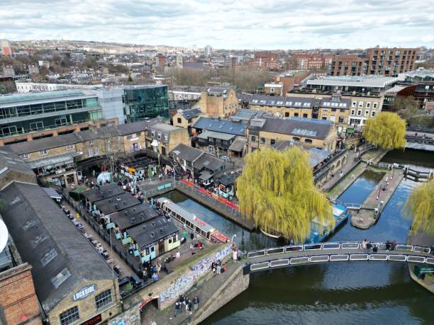 Food market Camden Lock London UK drone aerial view Food market Camden Lock London UK drone aerial view camden stables market stock pictures, royalty-free photos & images