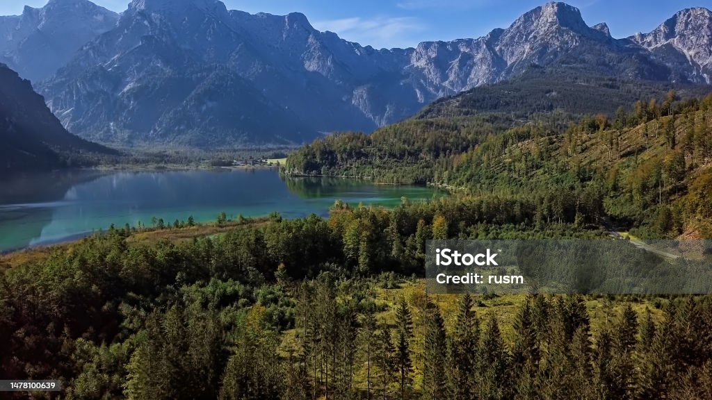 Aerial panorama of Lake Alm (Almsee) in Salzkammergut, Austria at summer morning. Aerial view of Almsee, Austria Aerial View Stock Photo
