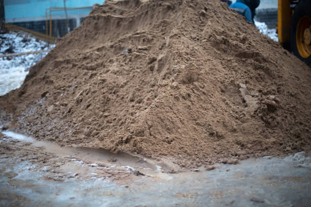 istock Mountain of sand on construction site. Bulk material. Building details. 1478103155