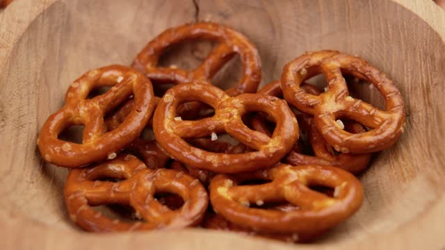 Bavarian crispy crackers pretzels in a rustic wooden bowl