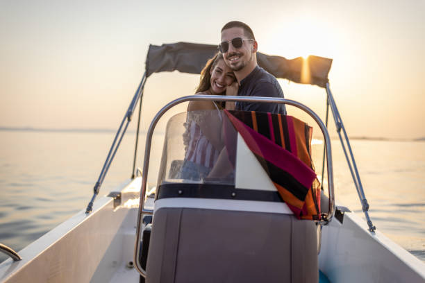 istock Couple enjoying a leasure boat trip 1478116674