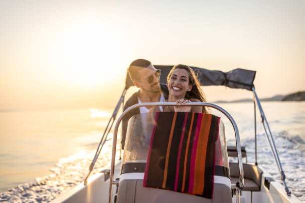 istock Young couple enjoy speedboat ride 1478120438
