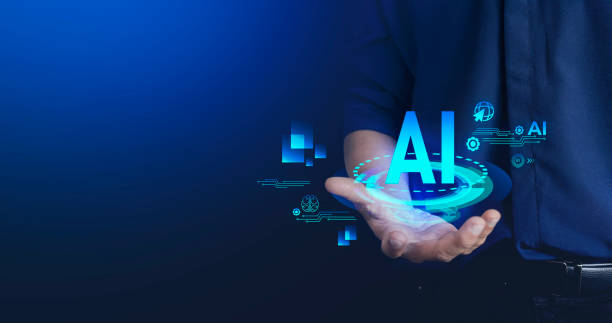 istock Businessman holding microchip processor with lights on the blue background. hologram digital chatbot, application, conversation assistant, AI Artificial Intelligence concept, digital chatbot on virtual screen. 1478121636