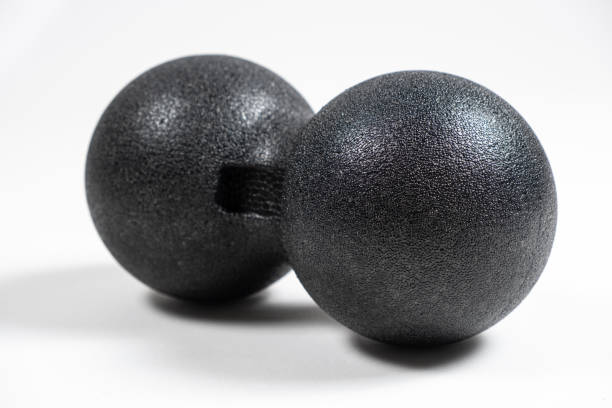 istock Double back massage ball, myofascial release, back muscle relaxation, self-massage. 1478124854