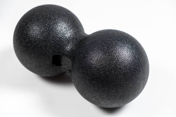 istock Double back massage ball, myofascial release, back muscle relaxation, self-massage. 1478124865