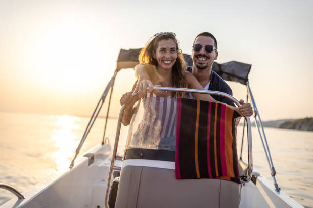 istock Happy Couple enjoying a summer boat trip 1478125672