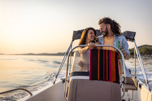 istock Couple enjoying a leasure boat trip 1478126004