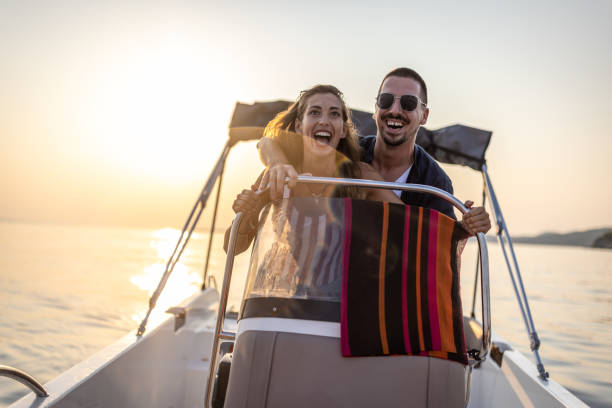 istock Happy Couple enjoying a summer boat trip 1478129349