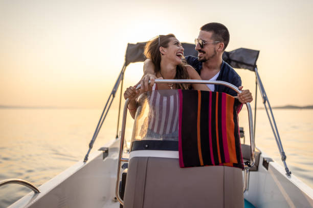 istock Young couple enjoy speedboat ride 1478129813