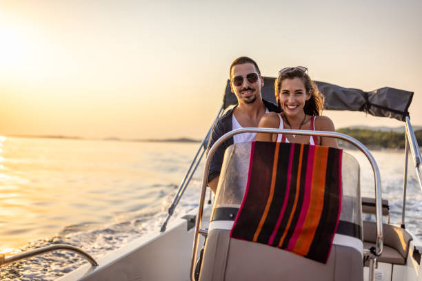 istock Young couple enjoy speedboat ride 1478133970