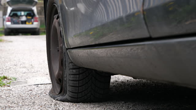 Flat Tire Deflated car wheel