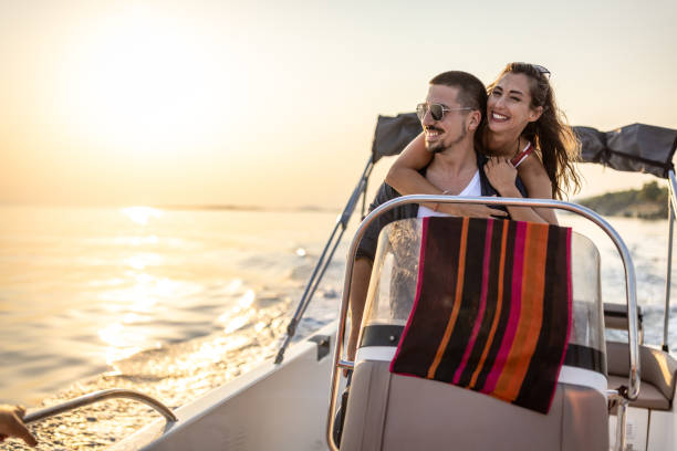 istock Young couple enjoy speedboat ride 1478134886
