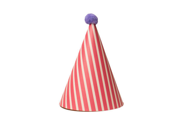 istock Bright and colorful birthday cap isolated on a white background. 1478136382