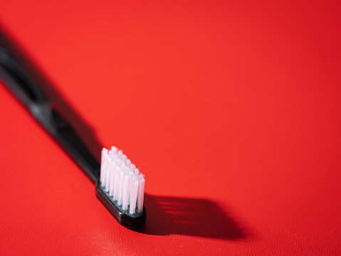 Toothbrush on a red background