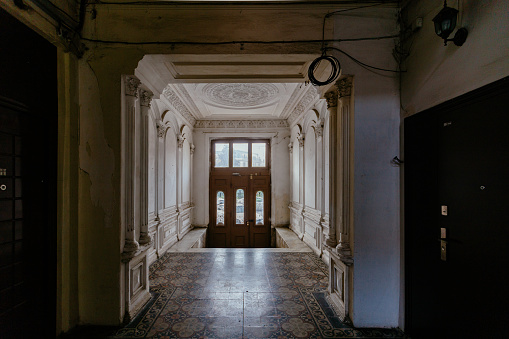 Entrance hall of abandoned mansion