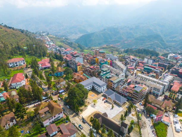 aerial view of landscape at the hill town in sapa city, lao cai province, vietnam in asia with the sunny light and sunset, mountain view in the clouds - lao cai province bildbanksfoton och bilder